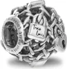 A close-up of a silver charm with chains and a padlock. Anteprima dell’immagine prodotto