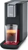 A close-up shot of a coffee machine with a glass of espresso. Produktbild-Vorschau