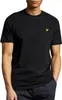 A man wearing a black t-shirt with a small yellow logo on the left chest. Produktbild-Vorschau