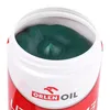 A close-up view of the top of a tub of green grease. Anteprima dell’immagine prodotto