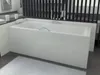 A white bathtub in a modern bathroom setting. Produktbild-Vorschau