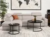 A living room setting with a sectional sofa, coffee tables, and a world map on the wall. Podgląd zdjęcia produktu
