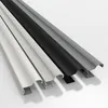 Four pieces of trim in different colors, arranged diagonally on a white background. Produktbild-Vorschau
