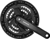 A black bicycle crankset with three chainrings is shown against a white background. Anteprima dell’immagine prodotto