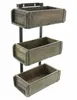 A three-tiered wooden shelf with three wooden crates attached to a black metal frame, displayed against a white background. Produktbild-Vorschau