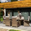 A couple is enjoying a meal at a table on a patio, surrounded by outdoor furniture. Náhled obrázku produktu