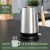 A stainless steel kettle with a wooden handle is shown on a kitchen counter, with text overlays highlighting its features. Produktbild-Vorschau