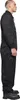 A person wearing a black jumpsuit, shown from the side. Náhled obrázku produktu