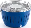A blue LotusGrill charcoal grill is shown from a slightly elevated front-side angle against a white background. Produktbild-Vorschau