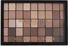 A top-down view of an eyeshadow palette with multiple shades of brown and beige. Náhľad obrázku produktu