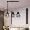 A bedroom setting with a bed and a pendant light fixture. Produktbild-Vorschau
