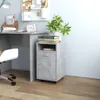 A corner of a home office with a desk, chair, and a filing cabinet. Anteprima dell’immagine prodotto