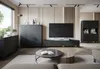 A modern living room with a TV and entertainment unit. Produktbild-Vorschau