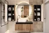 A modern bathroom vanity with a sink, mirror, and storage cabinets. Produktbild-Vorschau
