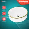 A white ceramic sink with a gold rim is shown against a teal background with abstract wavy lines. Text and icons highlighting product features are on the left side. Produktbild-Vorschau