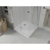 A modern bathroom scene featuring a corner shower enclosure with a white shower tray and glass doors. Podgląd zdjęcia produktu