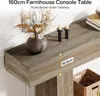 A close-up view of a rustic brown farmhouse console table with decorative items on top. Anteprima dell’immagine prodotto