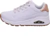 A side view of a white Skechers women's sneaker with rose gold accents and a brown sole. Náhled obrázku produktu