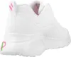 A close-up side view of a white sneaker. Voir les images du produit