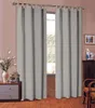 A room interior with curtains covering a window, a dresser, and chairs. Produktbild-Vorschau