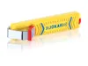 A yellow JOKARI cable knife with blue accents and a red adjustment knob is shown against a white background with a reflection. Produktbild-Vorschau