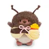 A plush toy bee character holding a small bag of fries. Produktbild-Vorschau