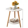 A round side table with sunflowers and a book on it, with dimensions indicated. Produktbild-Vorschau