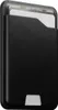A black leather cardholder with a light gray accent at the bottom, holding a credit card and some bills. Produktbild-Vorschau