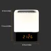 A product shot of a multi-functional bedside lamp with a digital clock display. Produktbild-Vorschau