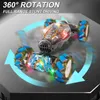 A remote-controlled stunt car performing a 360-degree rotation on a dark surface, with motion blur and light effects. Náhled obrázku produktu