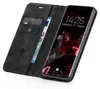 A black flip case for a Samsung Galaxy S9 is shown open, displaying credit cards and a banknote inserted into the case, and the phone's screen with a wallpaper and time displayed. Produktbild-Vorschau
