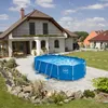 A backyard scene with a house, lawn, and an oval swimming pool. Náhled obrázku produktu