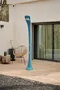 An outdoor patio with a blue shower, chair, and plant. Produktbild-Vorschau