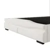 A close-up, side view of a white upholstered bed frame with a black slatted mattress support. Náhľad obrázku produktu