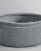 Close-up of a grey fabric basket with white stitching. Produktbild-Vorschau