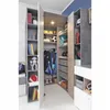 A corner of a modern bedroom with a walk-in closet filled with clothes and storage items. Produktbild-Vorschau