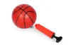A red basketball and a red ball pump are shown on a white background. Podgląd zdjęcia produktu