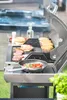 A barbecue grill with burgers and buns cooking on it, and vegetables in a pan. Náhled obrázku produktu