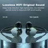 Close-up of black in-ear headphones with gold accents, resting on a textured metallic surface with a grid pattern. The background is a dark gradient. Produktbild-Vorschau