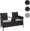 A black poly-rattan bench with cream cushions and a glass-top table in the center, shown against a white background. Produktbild-Vorschau