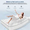 A woman is floating on a mattress with bubbles around her, suggesting comfort and lightness. The background is a light blue gradient. Produktbild-Vorschau