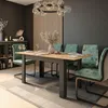 A dining room with a table and chairs set up for a meal. Produktbild-Vorschau