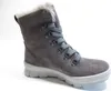 A single gray suede boot with fur trim and gray laces is shown against a white background. Produktbild-Vorschau