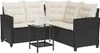 A black poly rattan L-shaped sofa with cream cushions and a small black coffee table with two glasses and a pitcher on it, set against a white background. Produktbild-Vorschau