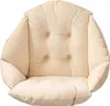 A beige cushion for a chair, with tufted detailing. Produktbild-Vorschau