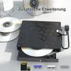 A black external DVD/CD drive with a honeycomb pattern, connected to a USB cable, with several CDs and memory cards around it. Produktbild-Vorschau