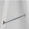 A close-up view of a metal bracket attached to a white surface, likely part of a furniture item. Náhľad obrázku produktu