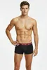 A man wearing black boxer shorts with a red waistband. Produktbild-Vorschau
