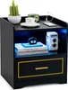A black nightstand with LED lighting, a drawer, and decorative items on top. Náhľad obrázku produktu