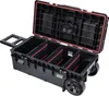 An open black tool box with multiple compartments and red accents, shown with its pull-out handle extended and wheels visible. Náhled obrázku produktu